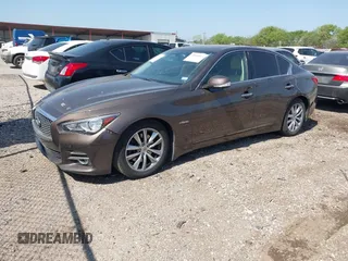 2014 Infiniti Q50 Hybrid Premium with VIN JN1AV7AP7EM691329, listed as a IAAI auction lot 41858913 with 144,688 mi miles and . Bid and sale history available at DreamBid. Image 2.