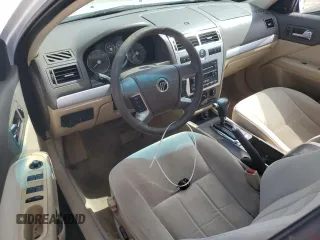 2006 Mercury Milan with VIN 3MEFM07186R641059, listed as a Copart auction lot 79450604 with 101,553 mi miles and Salvage title. Bid and sale history available at DreamBid. Image 8.