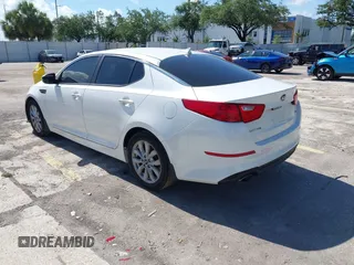 2015 Kia Optima LX z VIN KNAGM4A78F5614728, wystawiony jako IAAI lot #42494773 z przebiegiem 106 752 mil mil oraz . Historia ofert i sprzedaży dostępna na DreamBid. Obrazek 3.