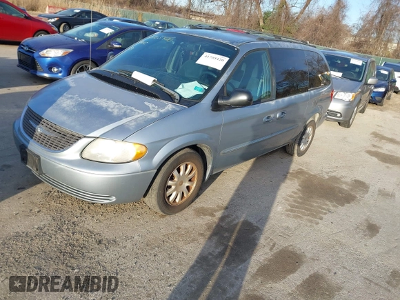 2003 Chrysler Town & Country LX with VIN 2C4GP44L73R238380, listed as a IAAI auction lot 41705420 with 129,225 mi miles and . Bid and sale history available at DreamBid. Image 2.