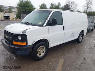 2007 Chevrolet Express Cargo Van with VIN 1GCFG15X771104491, listed as a IAAI auction lot 41984557 with 201,158 mi miles. Bid and sale history available at carsss.com. Image 2.