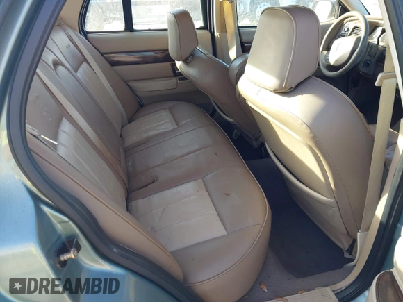 2005 Mercury Grand Marquis GS with VIN 2MEFM74WX5X627625, listed as a IAAI auction lot 41982651 with 87,044 mi miles and . Bid and sale history available at DreamBid. Image 8.