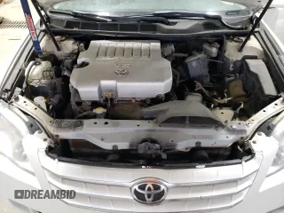 2006 Toyota Avalon XL z VIN 4T1BK36B86U150304, wystawiony jako Copart lot #57402735 z przebiegiem 244 634 mil mil oraz Czysty tytuł • Clean title. Historia ofert i sprzedaży dostępna na DreamBid. Obrazek 11.