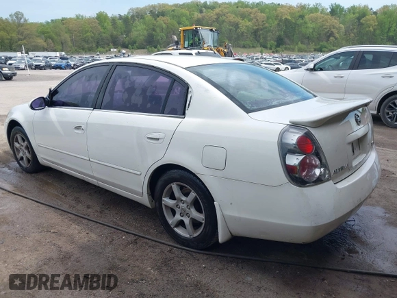 2002 Nissan Altima S with VIN 1N4AL11D92C137996, listed as a IAAI auction lot 42036830 with 227,793 mi miles. Bid and sale history available at carsss.com. Image 3.