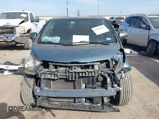 2012 Scion iQ with VIN JTNJJXB09CJ019082, listed as a IAAI auction lot 41798707 with 120,628 mi miles. Bid and sale history available at carsss.com. Image 13.