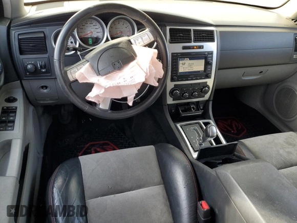 2006 Dodge Charger SRT-8 with VIN 2B3KA73W66H283699, listed as a Copart auction lot 44060975 with 126,105 mi miles and Salvage Title. Bid and sale history available at DreamBid. Image 8.