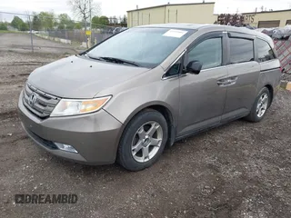 2012 Honda Odyssey EX-L with VIN 5FNRL5H68CB031930, listed as a IAAI auction lot 42222501 with 65,262 mi miles and . Bid and sale history available at DreamBid. Image 19.