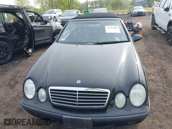1999 Mercedes-Benz CLK with VIN WDBLK65G1XT013704, listed as a IAAI auction lot 42115880 with 85,741 mi miles. Bid and sale history available at carsss.com. Image 12.