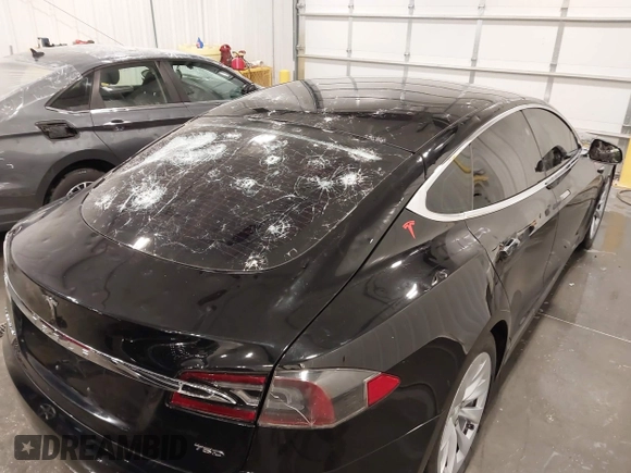 2018 Tesla Model S 75D with VIN 5YJSA1E2XJF248751, listed as a IAAI auction lot 42079081 with 75,904 mi miles and . Bid and sale history available at DreamBid. Image 6.