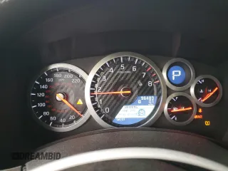2015 Nissan GT-R Premium z VIN JN1AR5EFXFM280731, wystawiony jako Copart lot #77720934 z przebiegiem 96 483 mil mil oraz Szkoda całkowita • Salvage title. Historia ofert i sprzedaży dostępna na DreamBid. Obrazek 9.