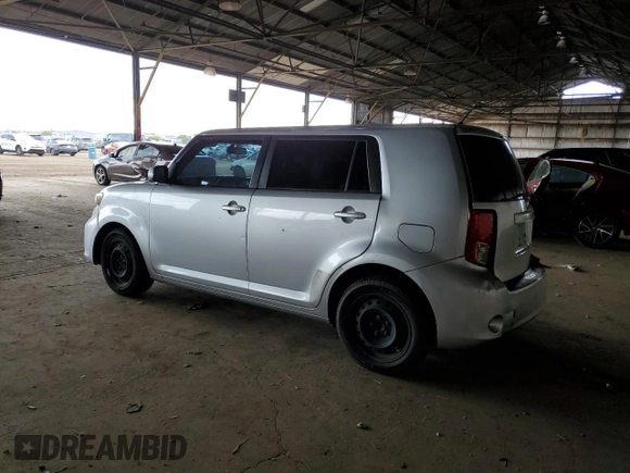 2012 Scion xB with VIN JTLZE4FE5CJ023537, listed as a Copart auction lot 55863315 with 230,648 mi miles and Salvage Title. Bid and sale history available at DreamBid. Image 2.