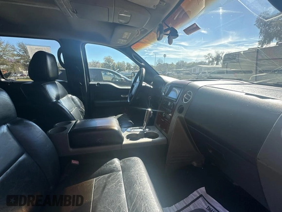 2005 Ford F-150 XLT with VIN 1FTPW12575KE12987, listed as a Copart auction lot 48539135 with 217,115 mi miles and Salvage Title. Bid and sale history available at carsss.com. Image 5.