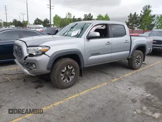 2021 Toyota Tacoma SR z VIN 3TMCZ5AN3MM374132, wystawiony jako IAAI lot #42068562 z przebiegiem 38 654 mil mil oraz . Historia ofert i sprzedaży dostępna na DreamBid. Obrazek 23.