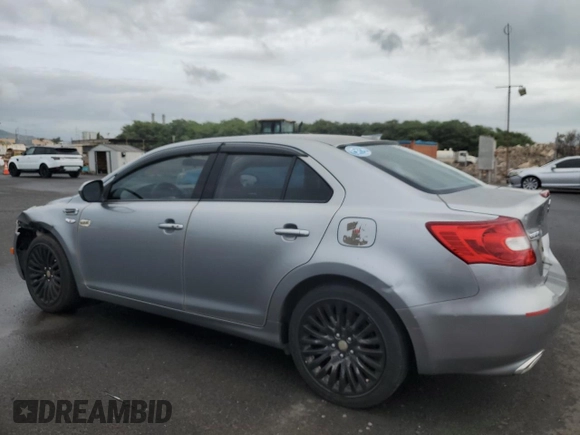 2011 Suzuki Kizashi SE z VIN JS2RE9A3XB6111196, wystawiony jako Copart lot #48076635 z przebiegiem 113 569 mil mil oraz Szkody całkowita. Historia ofert i sprzedaży dostępna na DreamBid. Obrazek 2.