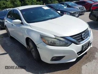 2017 Nissan Altima S z VIN 1N4AL3AP1HN310252, wystawiony jako IAAI lot #42490553 z przebiegiem 153 097 mil mil oraz . Historia ofert i sprzedaży dostępna na DreamBid. Obrazek 1.
