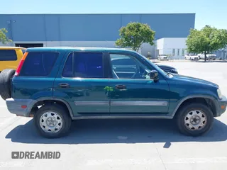 1998 Honda CR-V LX z VIN JHLRD1843WC083751, wystawiony jako IAAI lot #42356438 z przebiegiem 167 342 mil mil oraz . Historia ofert i sprzedaży dostępna na DreamBid. Obrazek 13.