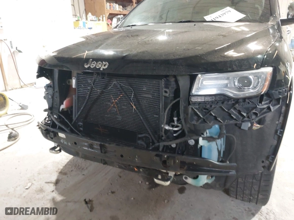 2014 Jeep Grand Cherokee Overland with VIN 1C4RJFCGXEC162109, listed as a IAAI auction lot 41943979 with 147,788 mi miles. Bid and sale history available at carsss.com. Image 12.