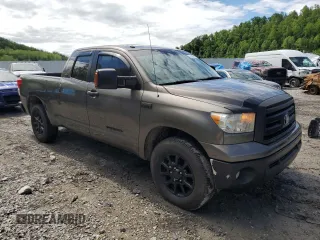 2010 Toyota Tundra z VIN 5TFUW5F19AX137573, wystawiony jako Copart lot #54045955 z przebiegiem 236 068 mil mil oraz Szkoda całkowita • Salvage title. Historia ofert i sprzedaży dostępna na DreamBid. Obrazek 4.
