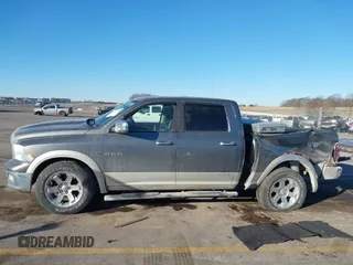 2009 Dodge 1500 Laramie with VIN 1D3HV13T29S778714, listed as a IAAI auction lot 41364288 with 151,451 mi miles and . Bid and sale history available at DreamBid. Image 14.