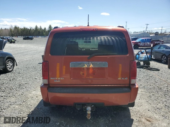 2007 Dodge Nitro SLT z VIN 1D8GU58K07W723331, wystawiony jako Copart lot #55169295 z przebiegiem 242 670 mil mil oraz Czysty tytuł • Clean title. Historia ofert i sprzedaży dostępna na DreamBid. Obrazek 6.