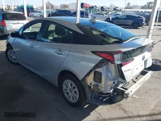 2019 Toyota Prius L Eco with VIN JTDKARFU3K3082893, listed as a IAAI auction lot 41370727 with 217,582 mi miles. Bid and sale history available at carsss.com. Image 3.