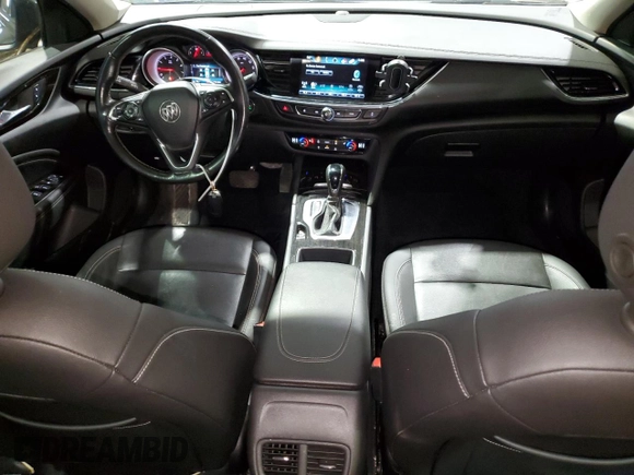 2018 Buick Regal Essence with VIN W04GP6SX8J1047130, listed as a Copart auction lot 50153395 with 97,679 mi miles and Clean title. Bid and sale history available at DreamBid. Image 8.
