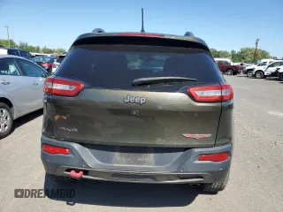 2015 Jeep Cherokee Trailhawk with VIN 1C4PJMBS8FW513391, listed as a Copart auction lot 64633115 with 115,406 mi miles and Clean title. Bid and sale history available at DreamBid. Image 6.