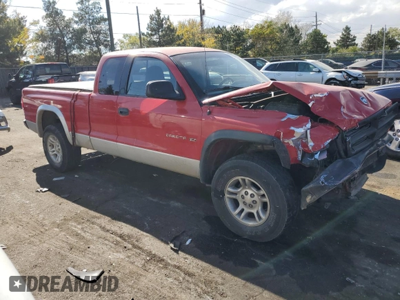 2001 Dodge Dakota Sport with VIN 1B7GG22N61S213300, listed as a Copart auction lot 76581804 with 105,460 mi miles and Salvage Title. Bid and sale history available at carsss.com. Image 4.