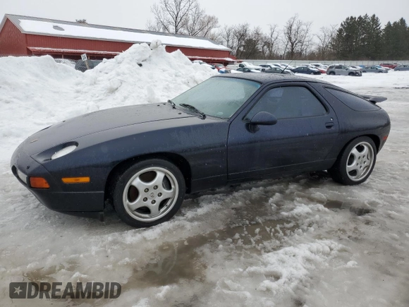 1993 Porsche 928 z VIN WP0AA2929PS815135, wystawiony jako Copart lot #86840514 z przebiegiem 69 263 mil mil oraz Szkody całkowita. Historia ofert i sprzedaży dostępna na DreamBid. Obrazek 1.