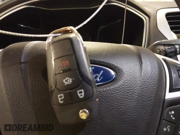 2016 Ford Fusion SE with VIN 1FA6P0H77G5127614, listed as a IAAI auction lot 41895210 with 164,006 mi miles and . Bid and sale history available at DreamBid. Image 11.