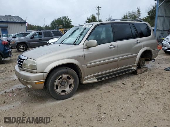 2001 Suzuki XL7 Touring z VIN JS3TY92V714106251, wystawiony jako Copart lot #79281204 z przebiegiem 334 901 mil mil oraz Szkoda całkowita • Salvage title. Historia ofert i sprzedaży dostępna na DreamBid. Obrazek 1.