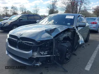 2018 BMW 5 Series 530i xDrive with VIN WBAJA7C54JWA74490, listed as a IAAI auction lot 41986285 with 68,768 mi miles and . Bid and sale history available at DreamBid. Image 6.
