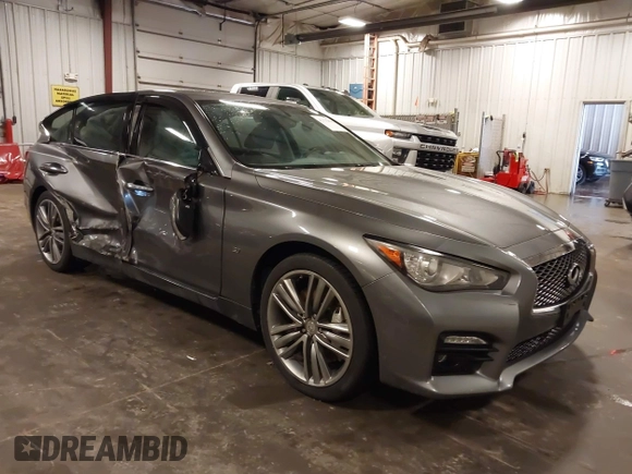 2014 Infiniti Q50 Premium with VIN JN1BV7ARXEM699902, listed as a IAAI auction lot 42135410 with 103,929 mi miles and . Bid and sale history available at DreamBid. Image 1.