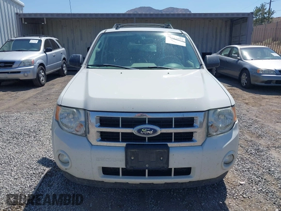 2011 Ford Escape XLT z VIN 1FMCU9DGXBKA93027, wystawiony jako IAAI lot #42712059 z przebiegiem 121 820 mil mil oraz . Historia ofert i sprzedaży dostępna na DreamBid. Obrazek 6.