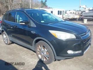 2013 Ford Escape SEL with VIN 1FMCU9HX3DUC18192, listed as a IAAI auction lot 41974404 with 61,054 mi miles. Bid and sale history available at carsss.com. Image 1.