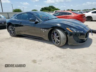 2014 Maserati GranTurismo Sport z VIN ZAM45VLAXE0083282, wystawiony jako Copart lot #61799155 z przebiegiem 71 517 mil mil oraz Szkoda całkowita • Salvage title. Historia ofert i sprzedaży dostępna na DreamBid. Obrazek 4.