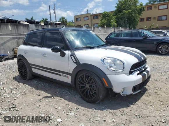 2016 MINI Countryman S with VIN WMWZC3C53GWT08355, listed as a Copart auction lot 53240215 with 62,674 mi miles and Salvage Title. Bid and sale history available at DreamBid. Image 4.