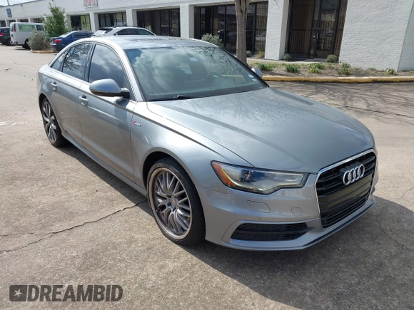 2013 Audi A6 3.0T Prestige with VIN WAUHGAFC4DN126258, listed as a IAAI auction lot 41512291 with 123,298 mi miles. Bid and sale history available at carsss.com. Image 1.