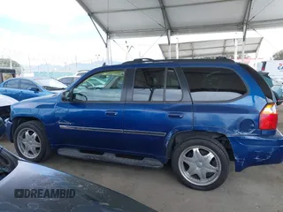 2006 GMC Envoy SLE with VIN 1GKDS13S562252049, listed as a IAAI auction lot 41940052 with 149,445 mi miles. Bid and sale history available at carsss.com. Image 15.