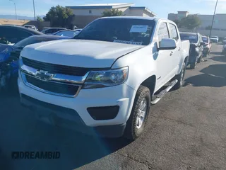 2019 Chevrolet Colorado 2WD Work Truck with VIN 1GCGSBEN0K1144041, listed as a IAAI auction lot 41668092 with 124,017 mi miles and . Bid and sale history available at DreamBid. Image 19.