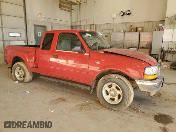 2000 Ford Ranger XLT with VIN 1FTZR15X5YPB27869, listed as a Copart auction lot 45150485 with 111,539 mi miles and Salvage Title. Bid and sale history available at carsss.com. Image 4.