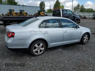 2009 Volkswagen Jetta SE with VIN 3VWRM71K99M156016, listed as a Copart auction lot 57711095 with 206,869 mi miles and Clean title. Bid and sale history available at DreamBid. Image 3.