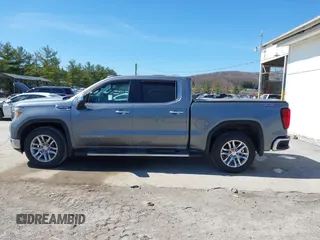 2021 GMC Sierra 1500 SLT z VIN 3GTU9DED7MG224460, wystawiony jako IAAI lot #41848912 z przebiegiem 65 319 mil mil oraz . Historia ofert i sprzedaży dostępna na DreamBid. Obrazek 14.