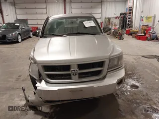 2010 Dodge Dakota with VIN 1D7CW3BP7AS103645, listed as a IAAI auction lot 41514841 with 158,125 mi miles and . Bid and sale history available at DreamBid. Image 13.