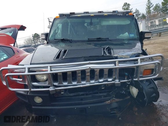 2006 Hummer H2 with VIN 5GRGN23U06H113353, listed as a IAAI auction lot 41476649 with 165,370 mi miles. Bid and sale history available at carsss.com. Image 12.