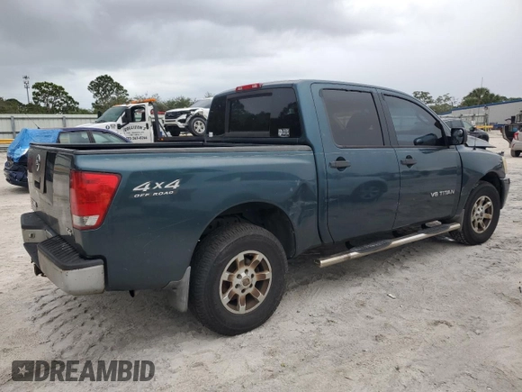 2006 Nissan Titan LE z VIN 1N6BA07B16N557411, wystawiony jako Copart lot #86058634 z przebiegiem 263 198 mil mil oraz Szkody całkowita. Historia ofert i sprzedaży dostępna na DreamBid. Obrazek 3.