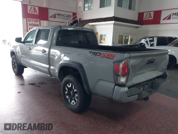 2021 Toyota Tacoma SR5 z VIN 3TMDZ5BN5MM114494, wystawiony jako IAAI lot #41723032 z przebiegiem 54 477 mil mil oraz . Historia ofert i sprzedaży dostępna na DreamBid. Obrazek 3.