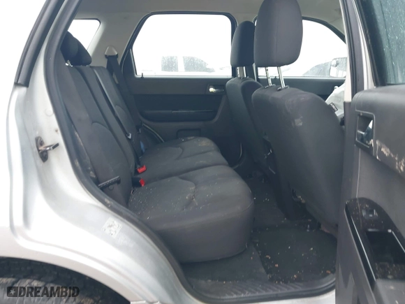 2011 Mazda Tribute Sport with VIN 4F2CY9C7XBKM01050, listed as a IAAI auction lot 41433870 with 122,287 mi miles. Bid and sale history available at carsss.com. Image 8.