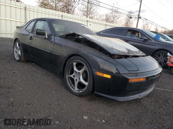 1986 Porsche 944 with VIN WP0AA0951GN156691, listed as a Copart auction lot 79901794 with 694,360 mi miles and Salvage Title. Bid and sale history available at DreamBid. Image 4.