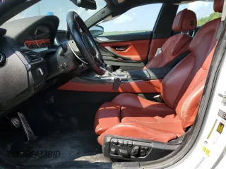 2015 BMW M6 z VIN WBS6C9C5XFD467711, wystawiony jako Copart lot #66574644 z przebiegiem 101 001 mil mil oraz Szkody całkowita. Historia ofert i sprzedaży dostępna na DreamBid. Obrazek 7.